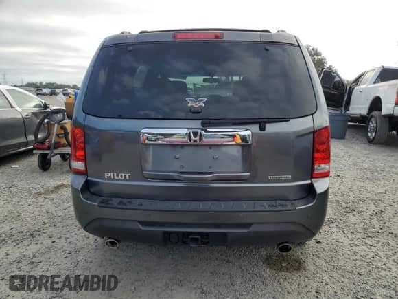 2012 Honda Pilot Touring с VIN 5FNYF3H95CB006467, выставлен на аукционе Copart как лот 87291485 с пробегом 173 822 миль миль и Списание • Salvage title. История ставок и продаж доступна на DreamBid. Изображение 6.