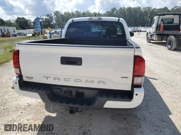 2023 Toyota Tacoma SR5 z VIN 3TMAZ5CN1PM206336, wystawiony jako Copart lot #82145395 z przebiegiem 26 296 mil mil oraz Szkoda całkowita • Salvage title. Historia ofert i sprzedaży dostępna na DreamBid. Obrazek 6.