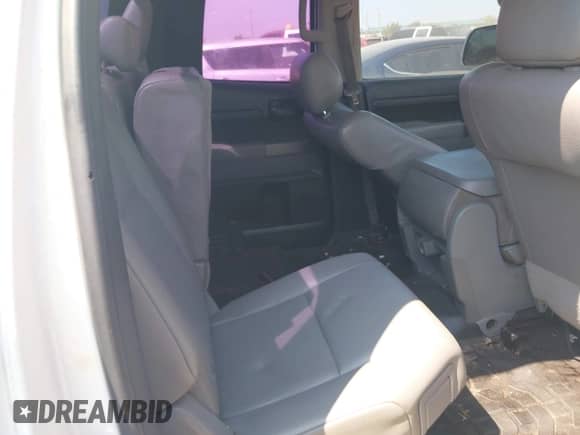 2012 Toyota Tundra z VIN 5TFRU5F18CX026656, wystawiony jako IAAI lot #42949363 z przebiegiem 294 338 mil mil oraz . Historia ofert i sprzedaży dostępna na DreamBid. Obrazek 8.