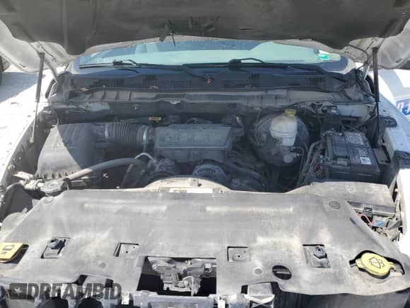 2013 Ram 1500 Tradesman z VIN 1C6RR7FP6DS645313, wystawiony jako Copart lot #57781625 z przebiegiem 299 001 mil mil oraz Szkoda całkowita • Salvage title. Historia ofert i sprzedaży dostępna na DreamBid. Obrazek 11.