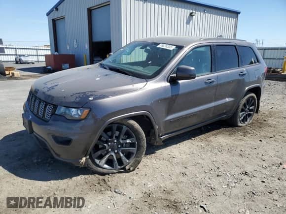 2021 Jeep Grand Cherokee Freedom with VIN 1C4RJFAG7MC809048, listed as a Copart auction lot 59535335 with 140,735 mi miles and Salvage title. Bid and sale history available at DreamBid. Image 1.