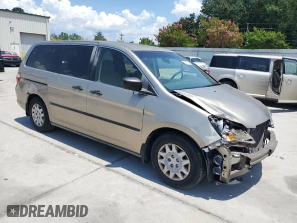 2005 Honda Odyssey LX with VIN 5FNRL38265B040940, listed as a Copart auction lot 65104285 with 299,632 mi miles and Salvage title. Bid and sale history available at DreamBid. Image 4.