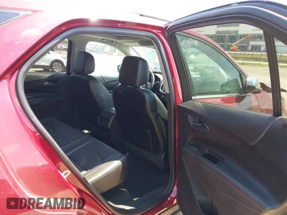 2018 Chevrolet Equinox Premier with VIN 3GNAXNEX1JL304730, listed as a IAAI auction lot 43246817 with 69,934 mi miles and . Bid and sale history available at DreamBid. Image 8.