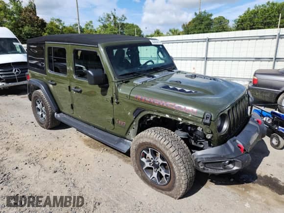 2021 Jeep Wrangler Unlimited Rubicon with VIN 1C4HJXFN0MW628283, listed as a Copart auction lot 62825015 with 74,782 mi miles and Salvage title. Bid and sale history available at DreamBid. Image 4.