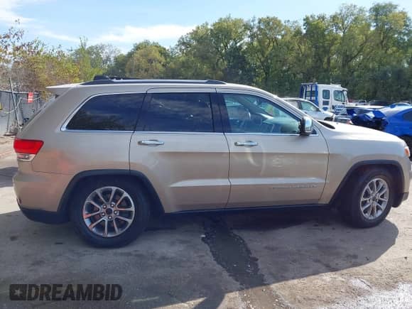 2014 Jeep Grand Cherokee Limited с VIN 1C4RJFBT4EC473940, выставлен на аукционе IAAI как лот 43380615 с пробегом 116 813 миль миль и . История ставок и продаж доступна на DreamBid. Изображение 13.