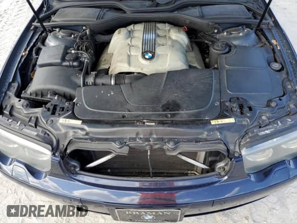 2005 BMW 7 Series 745i z VIN WBAGL63545DP75494, wystawiony jako Copart lot #72359904 z przebiegiem 143 878 mil mil oraz Szkoda całkowita • Salvage title. Historia ofert i sprzedaży dostępna na DreamBid. Obrazek 11.