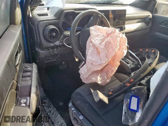 2024 Chevrolet Colorado 4WD Trail Boss z VIN 1GCPTEEK6R1144138, wystawiony jako Copart lot #69263535 z przebiegiem Nie podano mil oraz Szkoda całkowita • Salvage title. Historia ofert i sprzedaży dostępna na DreamBid. Obrazek 8.