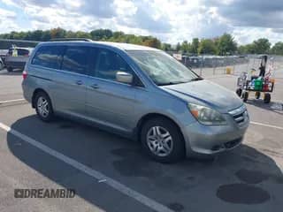 2005 Honda Odyssey EX z VIN 5FNRL384X5B065437, wystawiony jako IAAI lot #43375971 z przebiegiem 397 027 mil mil oraz . Historia ofert i sprzedaży dostępna na DreamBid. Obrazek 1.