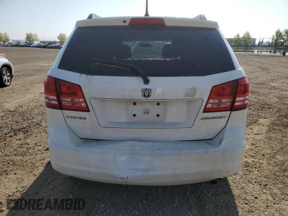 2010 Dodge Journey SE с VIN 3D4PG4FB4AT276716, выставлен на аукционе Copart как лот 81563845 с пробегом 232 699 миль миль и Списание • Salvage title. История ставок и продаж доступна на DreamBid. Изображение 6.