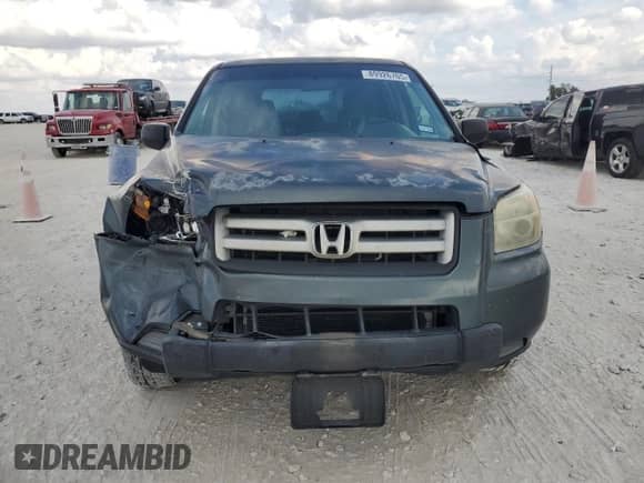 2006 Honda Pilot LX с VIN 5FNYF18196B027597, выставлен на аукционе Copart как лот 89926765 с пробегом 199 798 миль миль и Чистый • Clean title. История ставок и продаж доступна на DreamBid. Изображение 5.