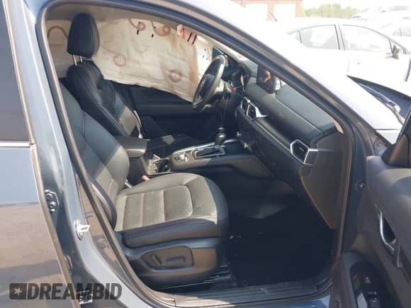 2022 Mazda CX-5 S Preferred z VIN JM3KFBCMXN1534309, wystawiony jako IAAI lot #42600606 z przebiegiem 40 529 mil mil oraz . Historia ofert i sprzedaży dostępna na DreamBid. Obrazek 5.