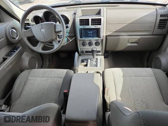 2007 Dodge Nitro SXT with VIN 1D8GU28K77W660050, listed as a Copart auction lot 81660235 with 155,676 mi miles and Salvage title. Bid and sale history available at DreamBid. Image 8.