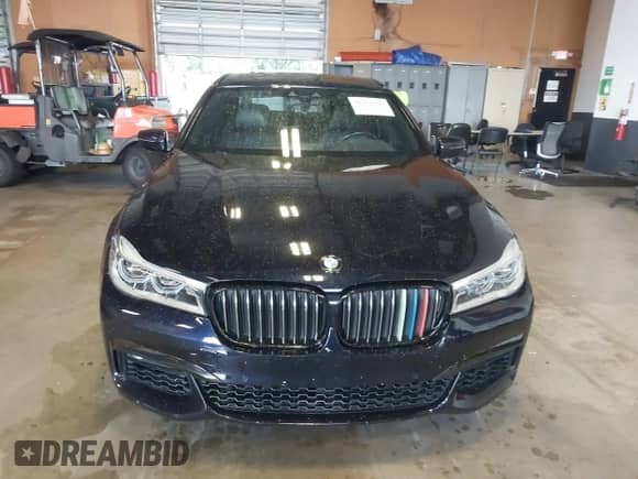 2019 BMW 7 Series 750i xDrive z VIN WBA7F2C51KB239044, wystawiony jako IAAI lot #42756026 z przebiegiem 65 028 mil mil oraz . Historia ofert i sprzedaży dostępna na DreamBid. Obrazek 6.