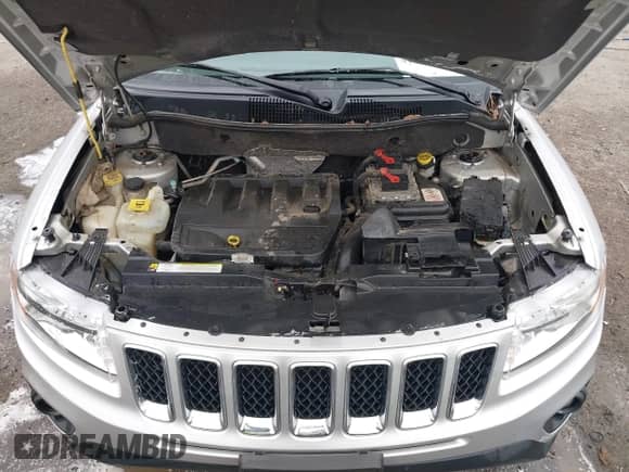 2012 Jeep Compass Limited z VIN 1C4NJCCB3CD511555, wystawiony jako IAAI lot #41752339 z przebiegiem 128 435 mil mil oraz . Historia ofert i sprzedaży dostępna na DreamBid. Obrazek 10.