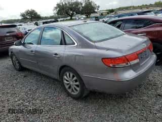 2007 Hyundai Azera SE с VIN KMHFC46F97A242080, выставлен на аукционе Copart как лот 45227394 с пробегом 147 742 миль миль и Списание • Salvage title. История ставок и продаж доступна на DreamBid. Изображение 2.