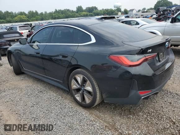 2023 BMW i4 eDrive35 with VIN WBY43AW0XPFP92914, listed as a Copart auction lot 66748865 with 32,088 mi miles and Salvage title. Bid and sale history available at DreamBid. Image 2.