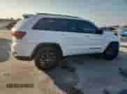 2018 Jeep Grand Cherokee Trailhawk z VIN 1C4RJFLTXJC256675, wystawiony jako Copart lot #80263015 z przebiegiem 130 103 mil mil oraz Szkoda całkowita • Salvage title. Historia ofert i sprzedaży dostępna na DreamBid. Obrazek 3.