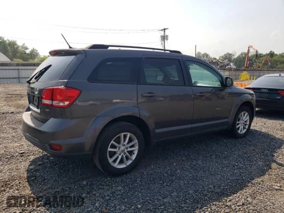 2014 Dodge Journey SXT with VIN 3C4PDCBG1ET270508, listed as a Copart auction lot 60978475 with 72,121 mi miles and Salvage title. Bid and sale history available at DreamBid. Image 3.