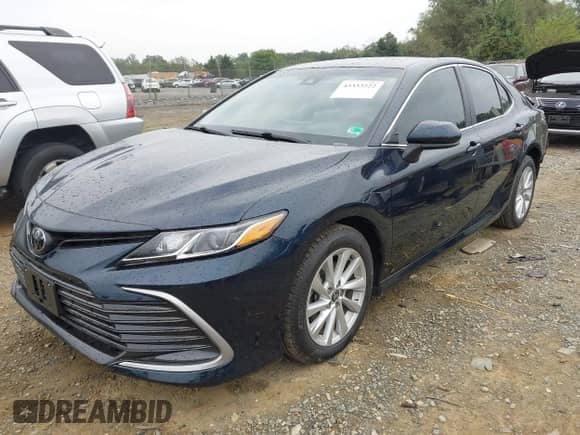 2021 Toyota Camry LE with VIN 4T1C11AK8MU548158, listed as a IAAI auction lot 43333222 with 34,824 mi miles and . Bid and sale history available at DreamBid. Image 18.