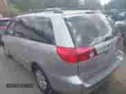 2009 Toyota Sienna XLE with VIN 5TDZK22C79S257834, listed as a IAAI auction lot 43212146 with 184,750 mi miles and . Bid and sale history available at DreamBid. Image 3.