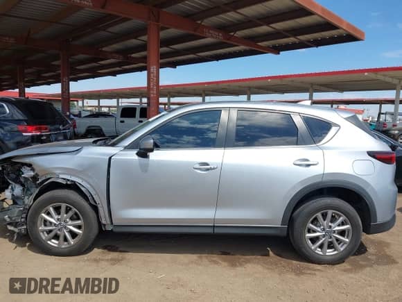 2023 Mazda CX-5 S Carbon Edition z VIN JM3KFBCM0P0137474, wystawiony jako IAAI lot #42785110 z przebiegiem 39 335 mil mil oraz . Historia ofert i sprzedaży dostępna na DreamBid. Obrazek 14.