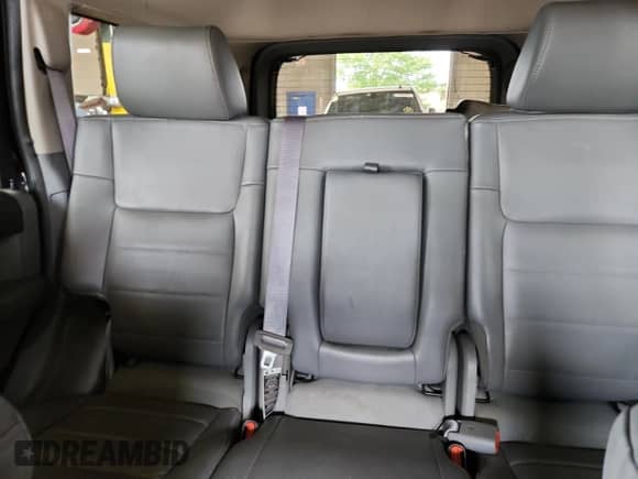 2006 Jeep Commander with VIN 1J8HH48N96C253790, listed as a Copart auction lot 64652495 with 158,803 mi miles and Salvage title. Bid and sale history available at DreamBid. Image 10.