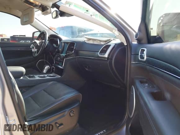 2020 Jeep Grand Cherokee Summit with VIN 1C4RJFJG2LC173184, listed as a IAAI auction lot 41343182 with 70,192 mi miles and . Bid and sale history available at DreamBid. Image 5.