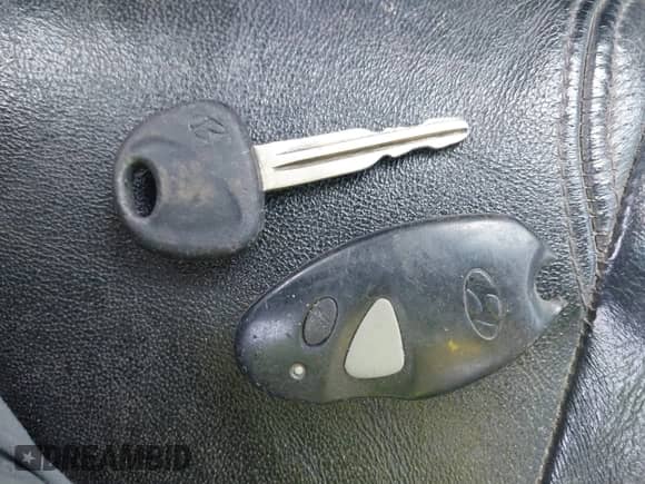 2004 Hyundai Tiburon GT с VIN KMHHN65F04U136207, выставлен на аукционе IAAI как лот 43035409 с пробегом Не указан миль и . История ставок и продаж доступна на DreamBid. Изображение 11.