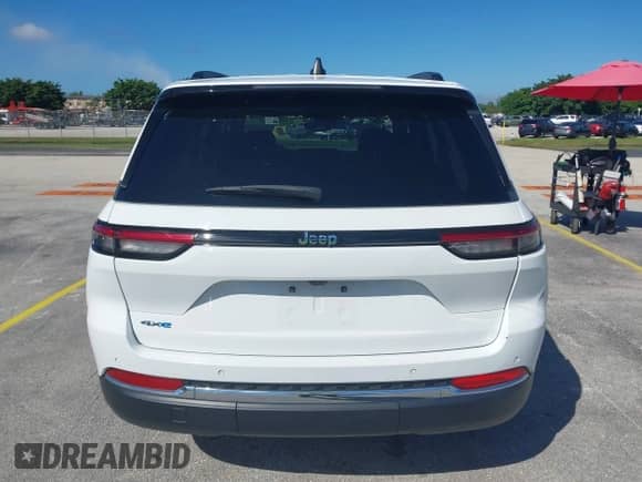 2024 Jeep Grand Cherokee with VIN 1C4RJYB63RC720666, listed as a IAAI auction lot 43307627 with 49,304 mi miles and . Bid and sale history available at DreamBid. Image 16.