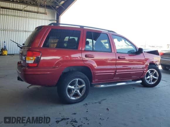 2002 Jeep Grand Cherokee Limited with VIN 1J4GW58N12C202691, listed as a Copart auction lot 64265975 with 118,480 mi miles and Salvage title. Bid and sale history available at DreamBid. Image 3.