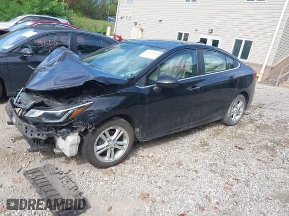 2017 Chevrolet Cruze LT with VIN 1G1BE5SM5H7120606, listed as a IAAI auction lot 43332130 with 97,691 mi miles and . Bid and sale history available at DreamBid. Image 2.