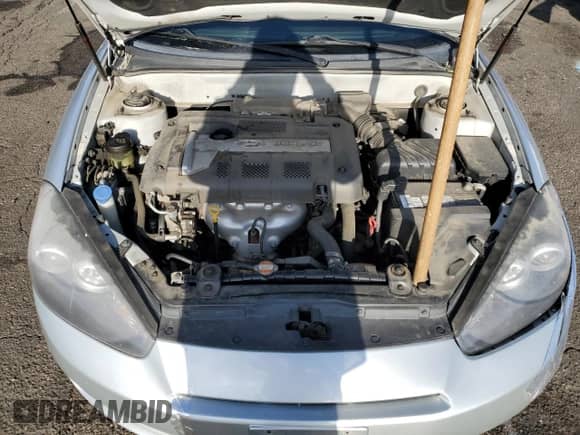 2007 Hyundai Tiburon GS with VIN KMHHM66DX7U246220, listed as a Copart auction lot 53555715 with 105,305 mi miles and Salvage title. Bid and sale history available at DreamBid. Image 11.