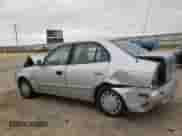 2003 Hyundai Accent GL z VIN KMHCG45C03U486899, wystawiony jako Copart lot #49313845 z przebiegiem 50 641 mil mil oraz Szkoda całkowita • Salvage title. Historia ofert i sprzedaży dostępna na DreamBid. Obrazek 2.