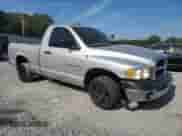 2003 Dodge 1500 ST with VIN 1D7HA16K23J602093, listed as a Copart auction lot 81409815 with 148,065 mi miles and Salvage title. Bid and sale history available at DreamBid. Image 4.