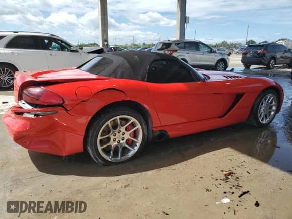 2004 Dodge Viper SRT-10 with VIN 1B3JZ65Z54V101307, listed as a Copart auction lot 83836345 with 20,119 mi miles and Salvage title. Bid and sale history available at DreamBid. Image 3.