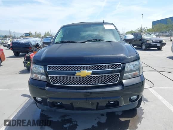 2013 Chevrolet Tahoe LS with VIN 1GNSKAE07DR355208, listed as a IAAI auction lot 42095090 with 159,409 mi miles and . Bid and sale history available at DreamBid. Image 12.