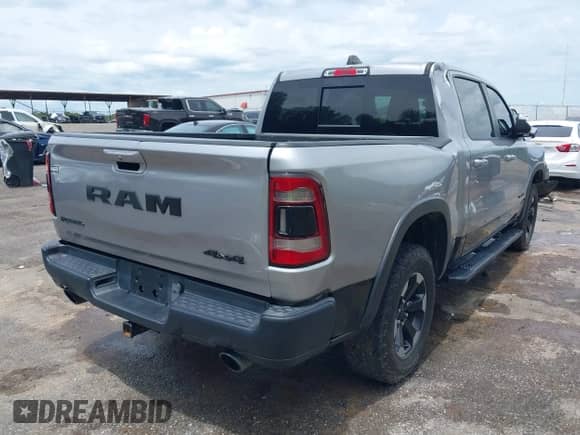 2020 Ram 1500 Rebel with VIN 1C6SRFLT8LN229872, listed as a IAAI auction lot 42135383 with 71,741 mi miles and . Bid and sale history available at DreamBid. Image 4.