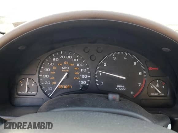 1999 Saturn SC with VIN 1G8ZR1275XZ375833, listed as a Copart auction lot 87960885 with 97,697 mi miles and Salvage title. Bid and sale history available at DreamBid. Image 9.