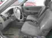 2005 Hyundai Accent GLS z VIN KMHCG35C55U341192, wystawiony jako Copart lot #70708994 z przebiegiem 174 872 mil mil oraz Szkoda całkowita • Salvage title. Historia ofert i sprzedaży dostępna na DreamBid. Obrazek 7.