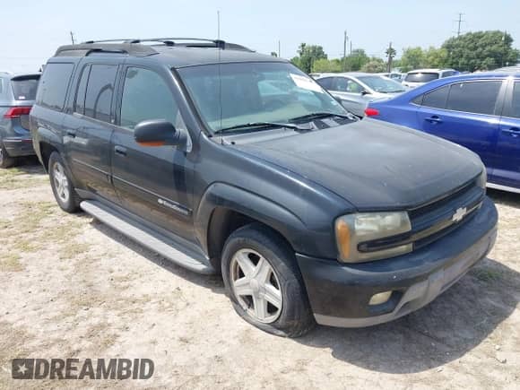 2003 Chevrolet TrailBlazer EXT LT with VIN 1GNET16SX36132686, listed as a IAAI auction lot 41950309 with 289,834 mi miles and . Bid and sale history available at DreamBid. Image 1.