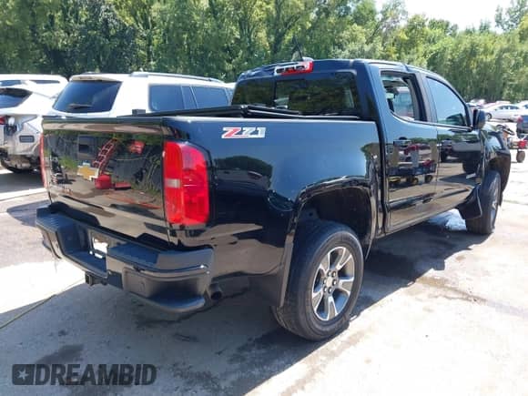 2020 Chevrolet Colorado 4WD Z71 with VIN 1GCGTDEN5L1159354, listed as a IAAI auction lot 43030671 with 81,493 mi miles and . Bid and sale history available at DreamBid. Image 4.