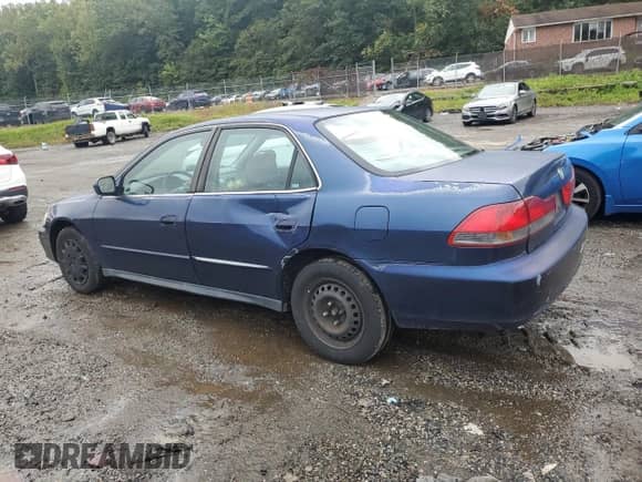 2001 Honda Accord LX z VIN 1HGCG564X1A062843, wystawiony jako Copart lot #80673095 z przebiegiem 240 783 mil mil oraz Szkoda całkowita • Salvage title. Historia ofert i sprzedaży dostępna na DreamBid. Obrazek 2.