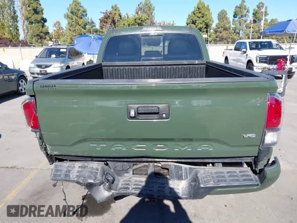 2021 Toyota Tacoma SR5 z VIN 3TMDZ5BN8MM114649, wystawiony jako IAAI lot #43493615 z przebiegiem 63 288 mil mil oraz . Historia ofert i sprzedaży dostępna na DreamBid. Obrazek 17.