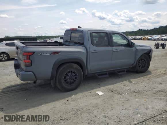 2023 Nissan Frontier SV with VIN 1N6ED1EK4PN663365, listed as a Copart auction lot 70290965 with 63,644 mi miles and Salvage title. Bid and sale history available at DreamBid. Image 3.