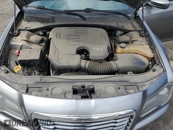 2012 Chrysler 300 S z VIN 2C3CCABGXCH279482, wystawiony jako Copart lot #80585435 z przebiegiem 166 954 mil mil oraz Nie do naprawy • Non repairable. Historia ofert i sprzedaży dostępna na DreamBid. Obrazek 11.