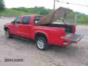 2002 Dodge Dakota Sport with VIN 1B7HG38N62S670613, listed as a IAAI auction lot 42133366 with 156,977 mi miles and . Bid and sale history available at DreamBid. Image 3.