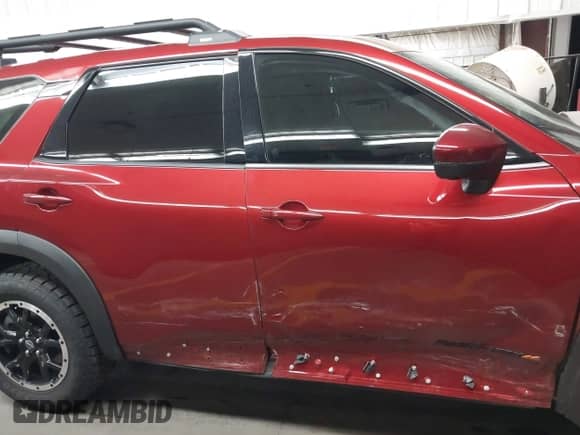 2023 Nissan Pathfinder Rock Creek with VIN 5N1DR3BD7PC276625, listed as a IAAI auction lot 42226402 with 11,872 mi miles and . Bid and sale history available at DreamBid. Image 13.