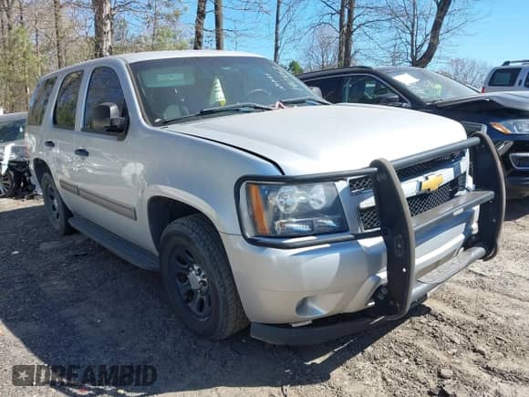 2014 Chevrolet Tahoe Commercial z VIN 1GNLC2E07ER162842, wystawiony jako IAAI lot #41848453 z przebiegiem 175 338 mil mil oraz . Historia ofert i sprzedaży dostępna na DreamBid. Obrazek 1.