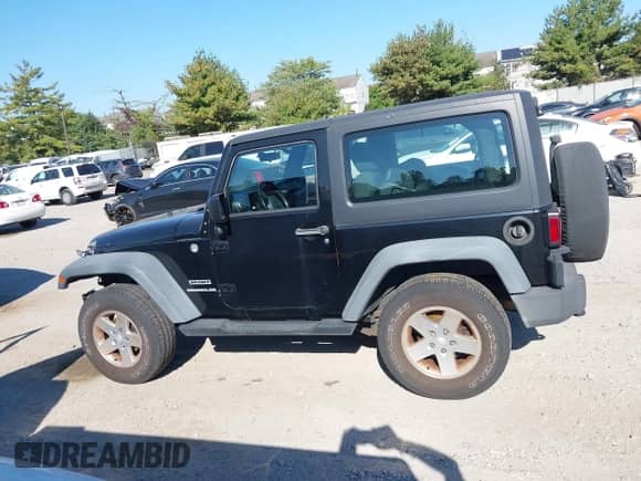 2012 Jeep Wrangler Sport with VIN 1C4GJWAG3CL239118, listed as a IAAI auction lot 43361839 with 89,001 mi miles and . Bid and sale history available at DreamBid. Image 14.
