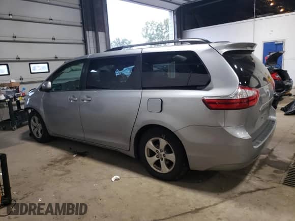 2016 Toyota Sienna LE with VIN 5TDKK3DC7GS729578, listed as a Copart auction lot 87075935 with 111,115 mi miles and Salvage title. Bid and sale history available at DreamBid. Image 2.
